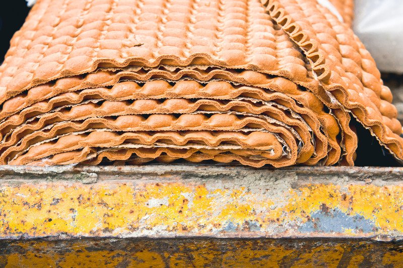 stack of used carpet underlay