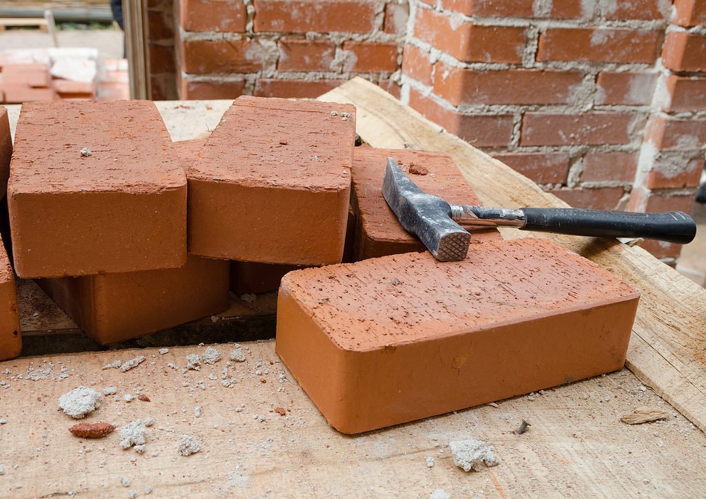 brick hammer on bricks