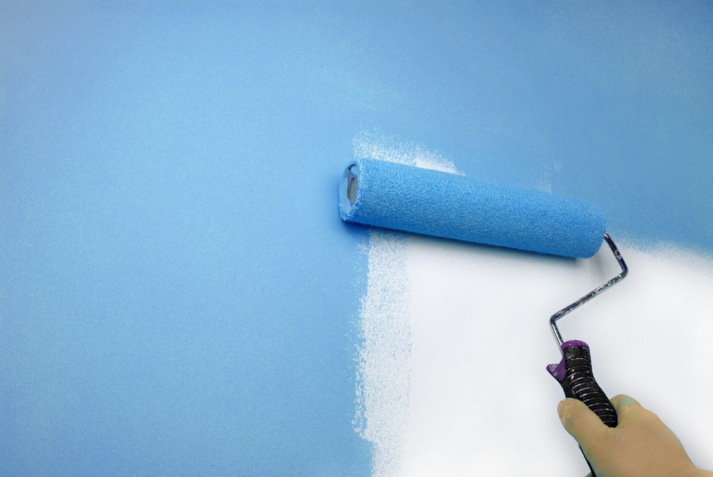 painting wall using a roller