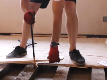 builder removing existing wood floor